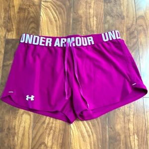 Purple size Medium Under Armour shorts.